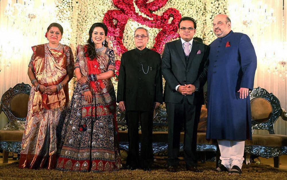 President Pranab Mukherjee with BJP National President Amit shah and his son Jay and daughter in law Rishita during their wedding reception.