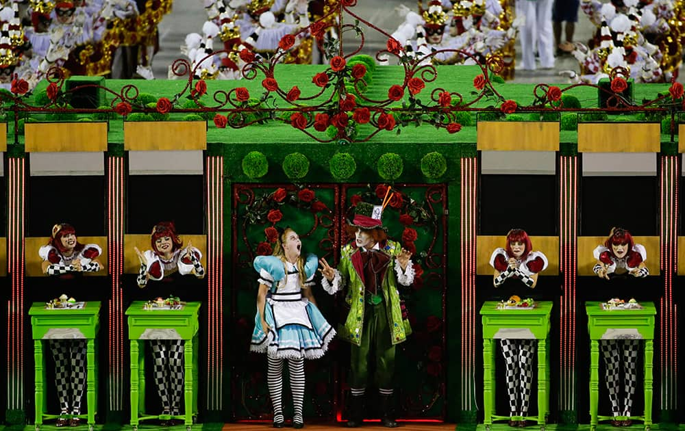 Performers from the Academicos do Grande Rio samba school parade during carnival celebrations at the Sambadrome in Rio de Janeiro, Brazil.