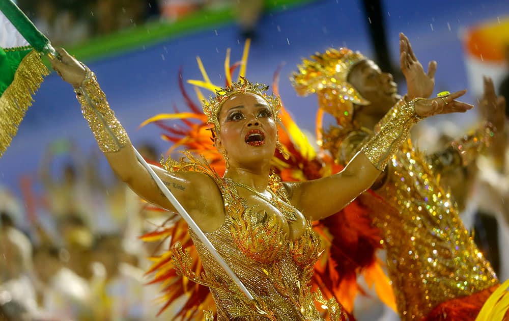 Performers from the Mocidade samba school, parade during Carnival celebrations at the Sambadrome in Rio de Janeiro, Brazil.