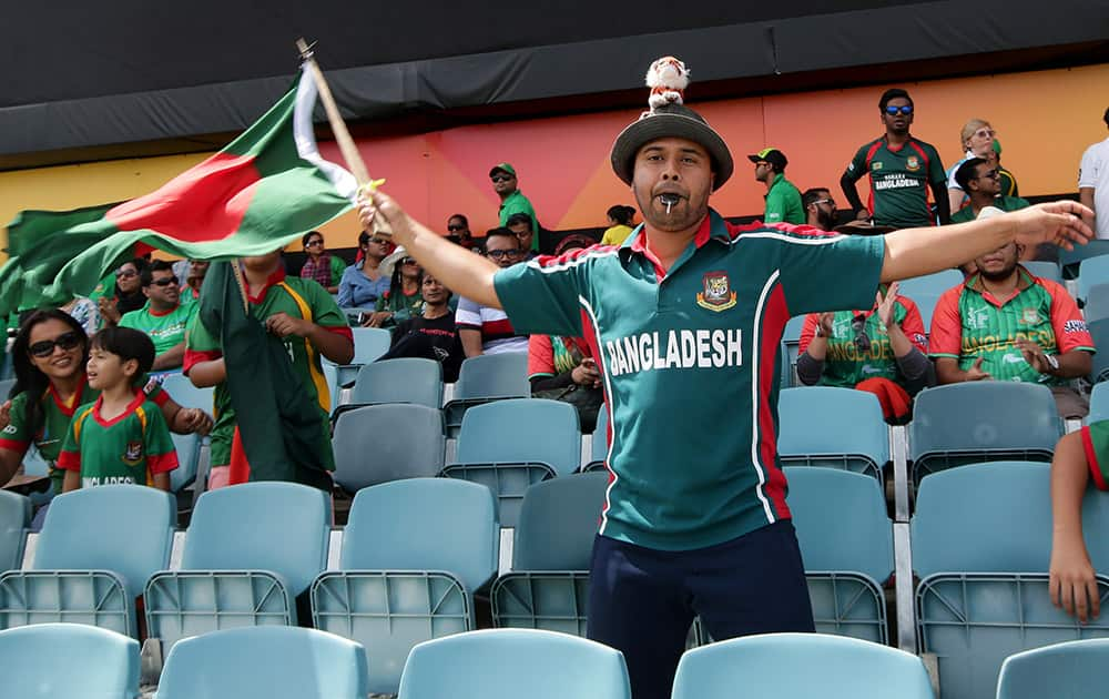 A Bangladesh supporter waves his national flag ahead of his team's Cricket World Cup Pool A match against Afghanistan in Canberra, Australia.