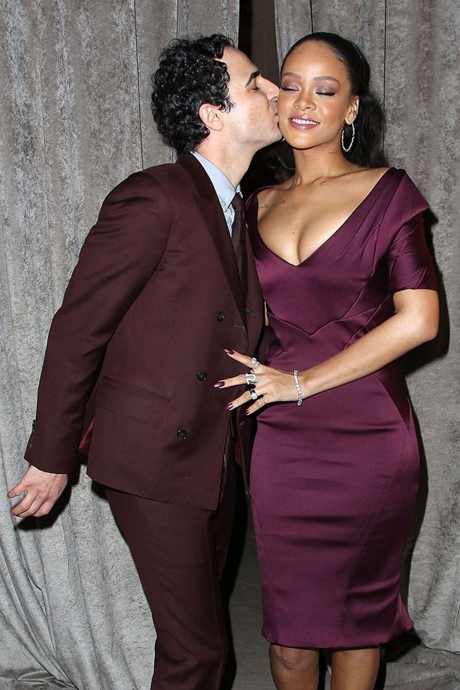  Zac Posen kisses Rihanna at Posen's Fall 2015 show during Fashion Week in New York.