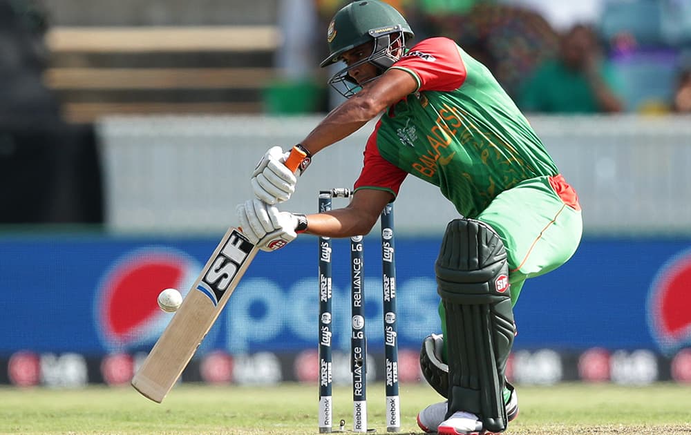 Bangladesh’s Mahmudullah hits the ball during their Cricket World Cup Pool A match against Afghanistan in Canberra, Australia.