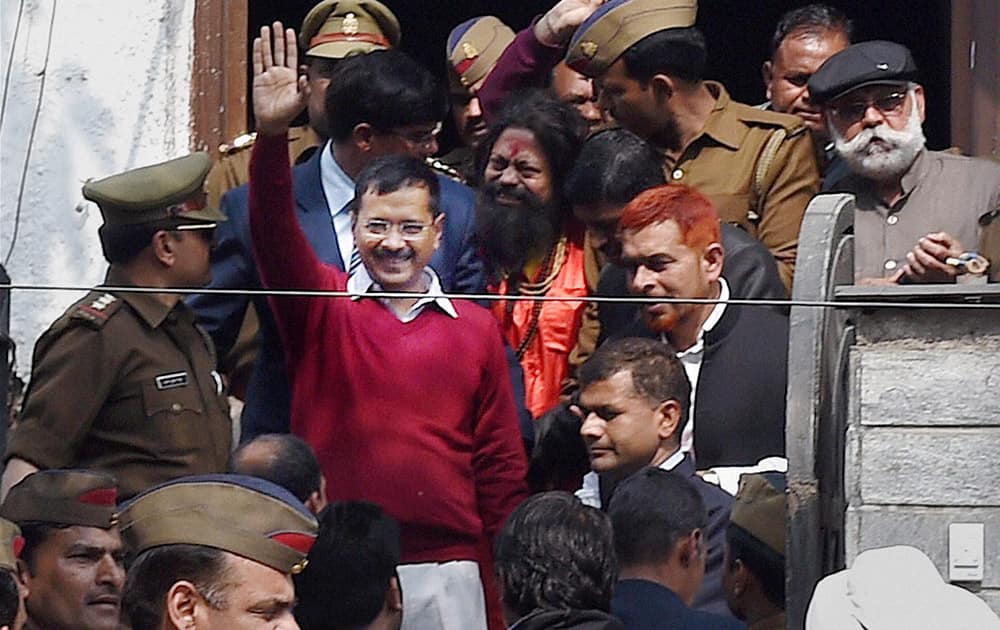 Delhi Chief Minister Arvind Kejriwal waves to supporters at a Janata Darbar at Aam Aadmi Partys Kaushambi office in Ghaziabad.