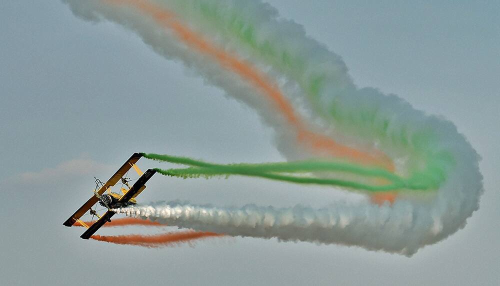 Swedens aerobatic display team Scandinavian Air Show performs during the inauguration of the AERO INDIA 2015 at Yelahanka Air Base in Bengaluru.