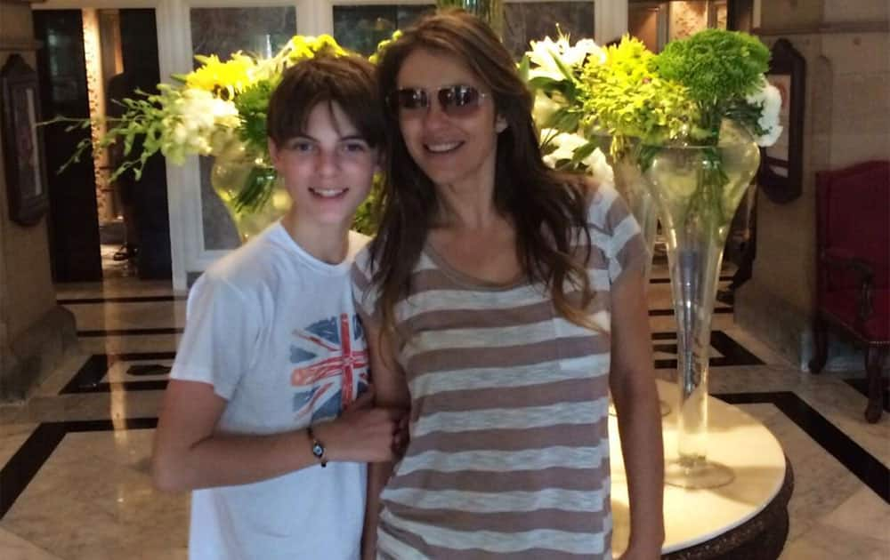 In the glorious Taj Hotel with my giant 12 year old. India  - twitter @ElizabethHurley