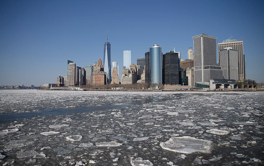 Ice flows pass through New York Harbor, in New York.