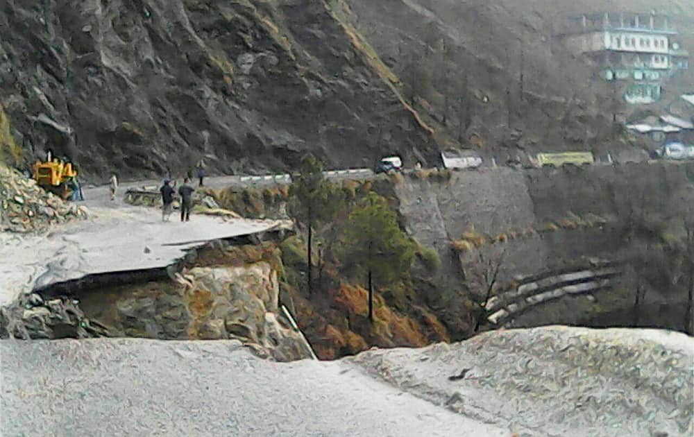 The National highway damaged due to heavy hailstorm at Makarkot in Ramban, Jammu.