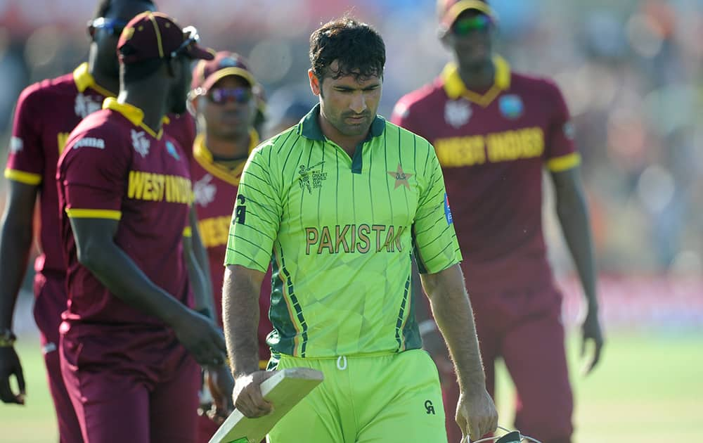 Pakistan's Sohail Khan walks from the field after they lost their Cricket World Cup match to the West Indies by 150 runs in Christchurch, New Zealand.