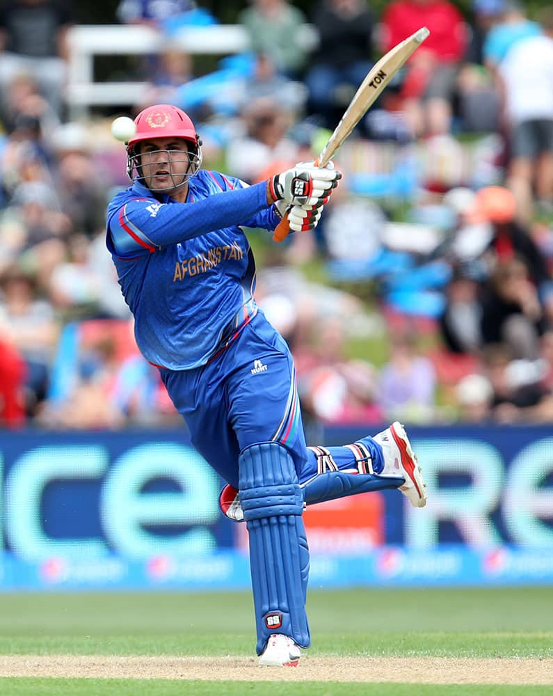 Afghanistan’s Mohammad Nabi hits the ball during their Cricket World Cup match against Sri Lanka in Dunedin, New Zealand.