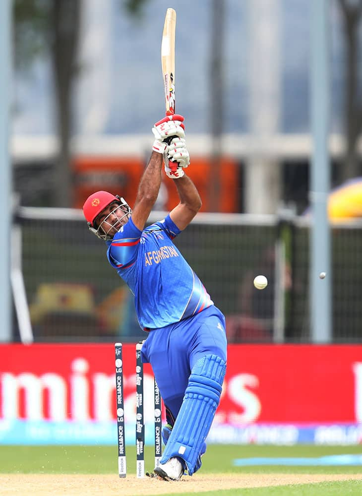 Afghanistan’s Dawlat Zadran is bowled during their Cricket World Cup match against Sri Lanka in Dunedin, New Zealand.