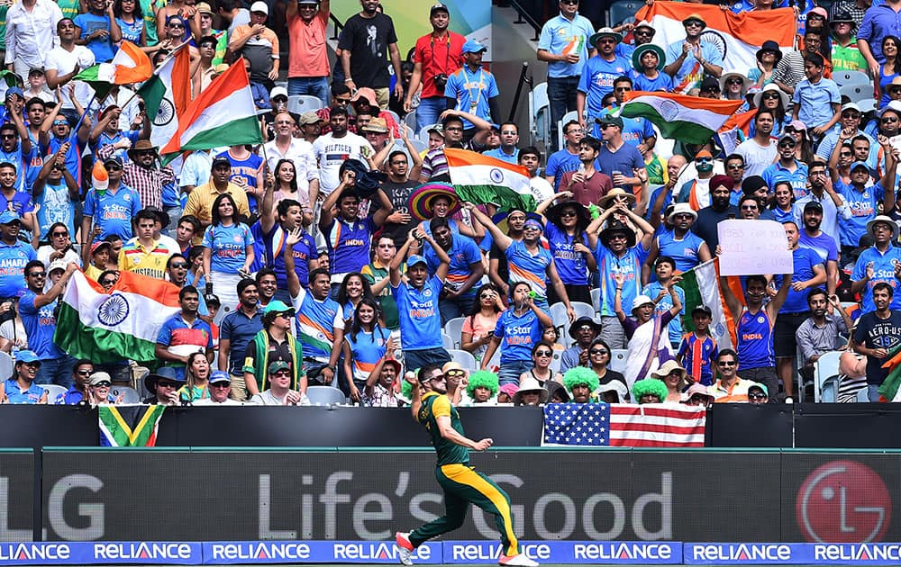 South African players celebrate the wicket of India's Rohit Sharma during their Cricket World Cup pool B match in Melbourne, Australia.