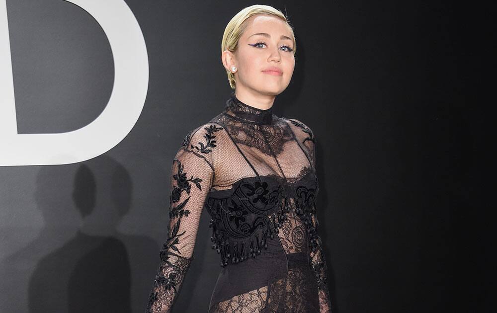 Miley Cyrus arrives at the Tom Ford Autumn/Winter 2015 Womenswear Presentation at Milk Studios.