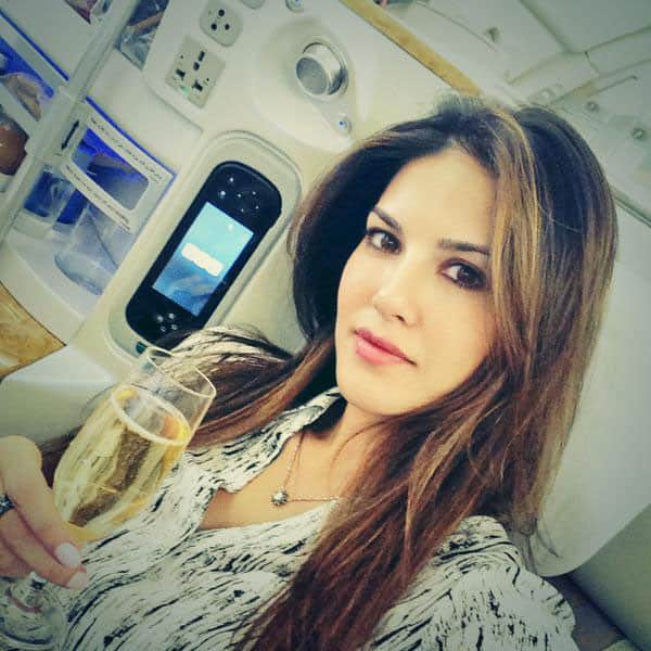 Sunny Leone :- A little bubbly before taking off!! Chin chin everyone!! -twitter