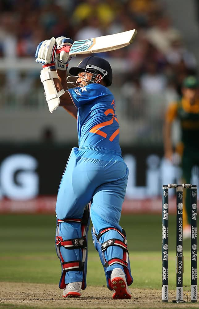 India's Ajinkya Rahane, plays a shot during their Cricket World Cup pool B match against South Africa in Melbourne, Australia.