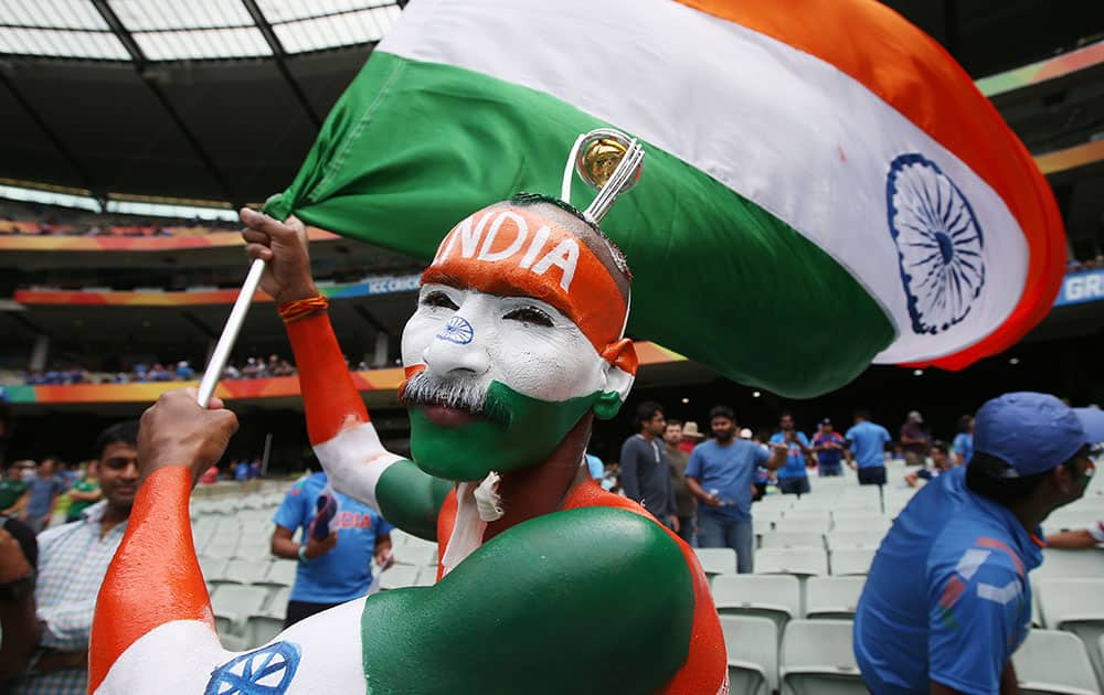 A Indian fan waves a flag ahead of their Cricket World Cup pool B match against South Africa in Melbourne, Australia.