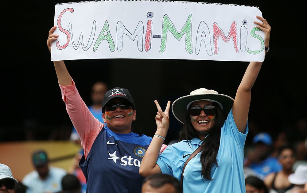 Indian supporters hold banners up ahead of their Cricket World Cup pool B match against South Africa in Melbourne, Australia.