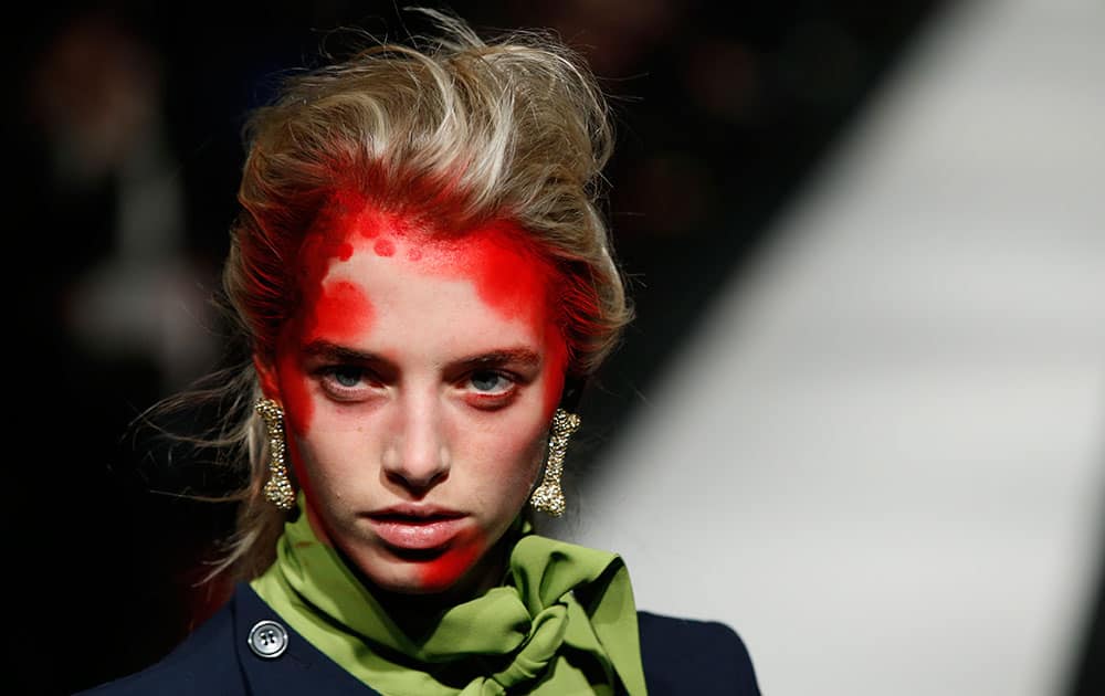 A model wears an outfit by designer Vivienne Westwood, for her Red Label Autumn/Winter 2015 show at London Fashion Week.