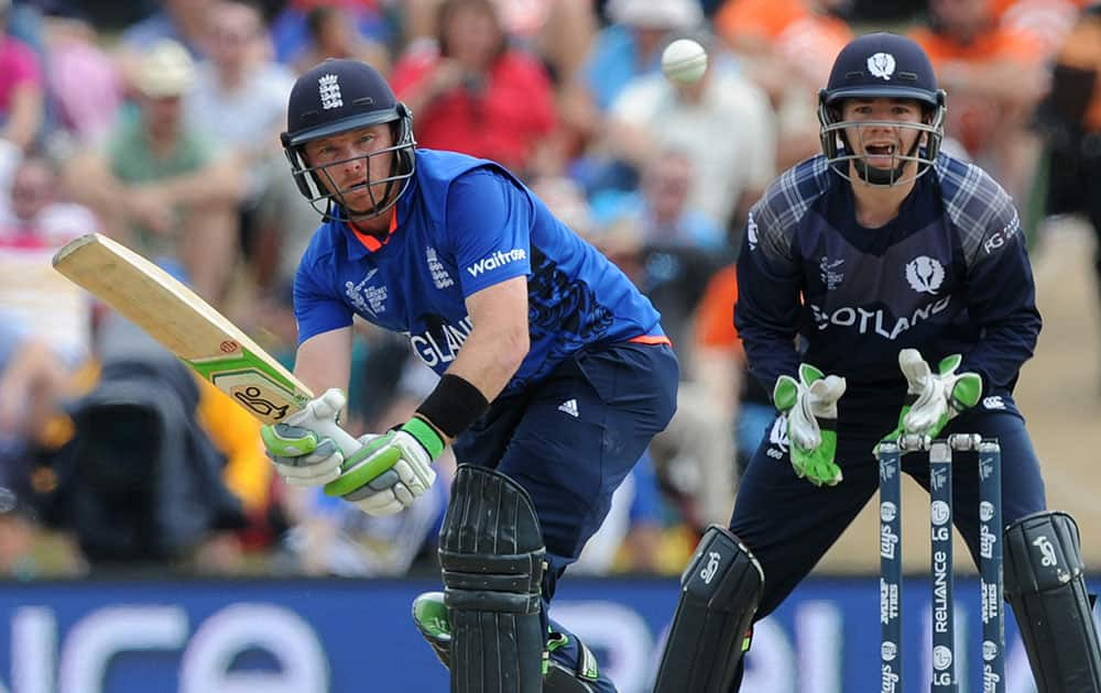 England's Ian Bell play's a shot as Scotland's wicketkeeper Matt Cross watches the ball during their Cricket World Cup match in Christchurch, New Zealand.