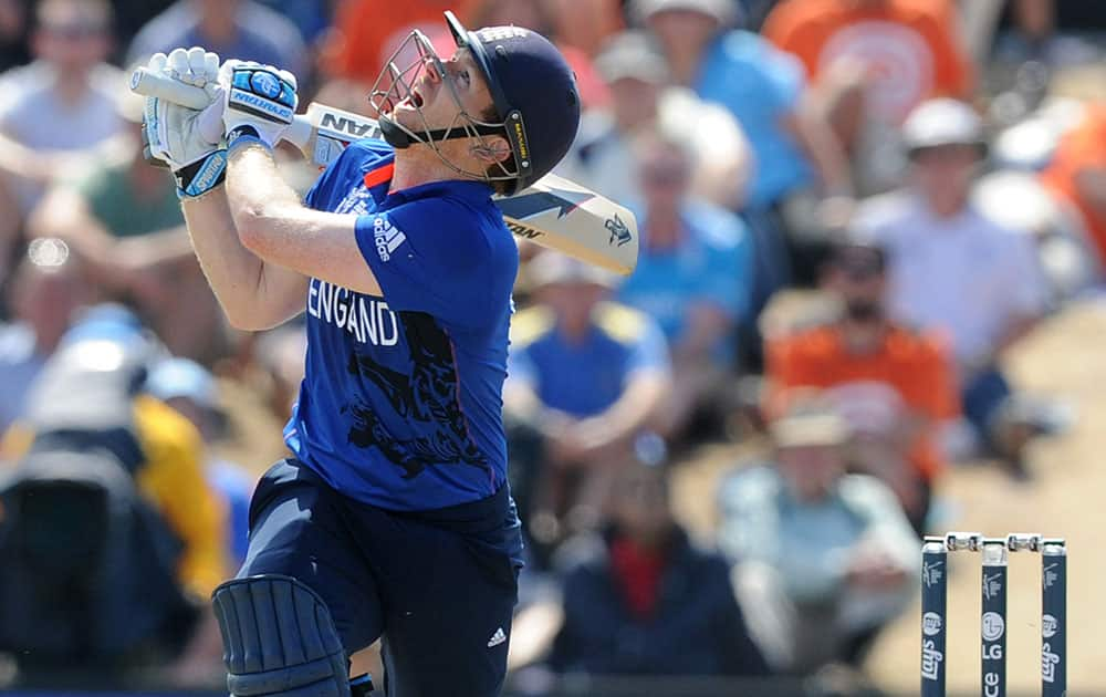 England’s captain Eoin Morgan watches the ball during their Cricket World Cup match against Scotland in Christchurch, New Zealand.