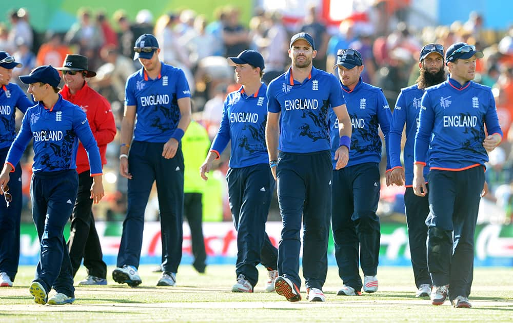 The England team leave the field after they defeated Scotland by 119 runs in their Cricket World Cup match in Christchurch, New Zealand.