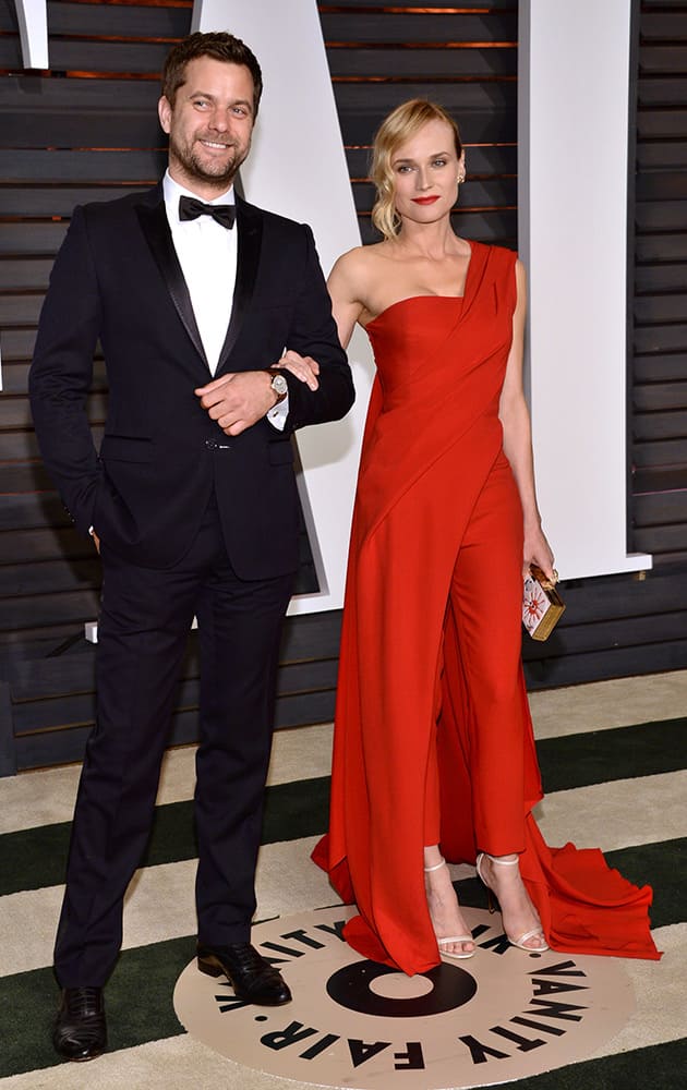 Joshua Jackson, left, and Diane Kruger arrive at the 2015 Vanity Fair Oscar Party.