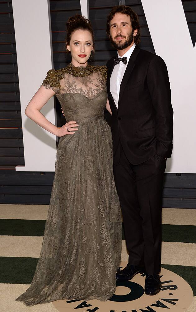 Kat Dennings, left, and Josh Groban arrive at the 2015 Vanity Fair Oscar Party.