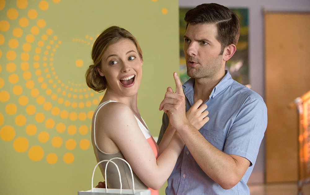 Gillian Jacobs and Adam Scott appear in a scene from 