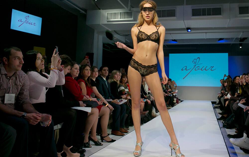 The 2015 CURVExpo and Invista sleepwear, loungewear and swim collections are modeled during the 2nd annual Lingerie Fashion Night, 