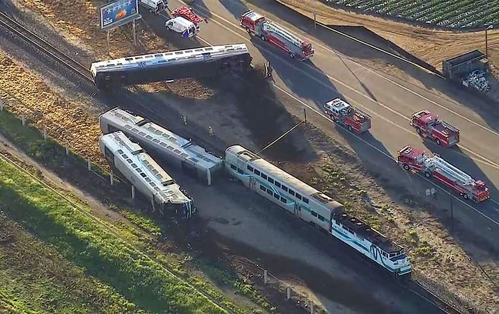 This image from video provided by KABC-TV Los Angeles shows wreckage of a Metrolink commuter train after it crashed into a truck and derailed early, in Oxnard, Calif.