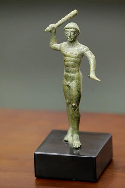 An Etruscan bronze statuette depicting the Greek hero Herakles is displayed at a ceremony to return the statue as well as an 18th-century work attributed to painter Giovanni Battista Tiepolo, 'The Holy Trinity appearing to Saint Clement,' to the Italian government, at the United States Attorney’s Office for the Southern District of New York.