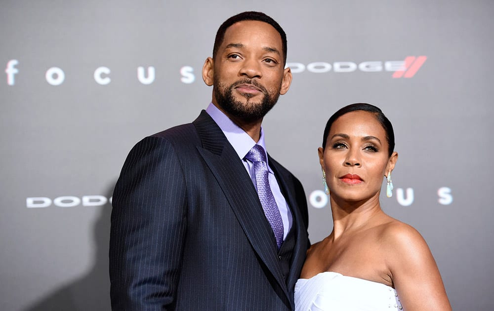 Will Smith and Jada Pinkett Smith arrive at the world premiere of 'Focus' at the TCL Chinese Theatre, in Los Angeles.