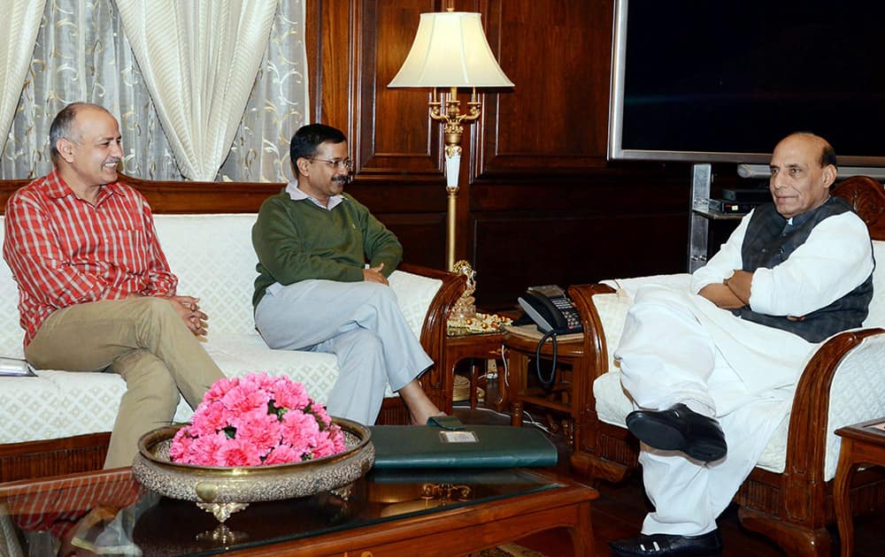 Delhi Chief Minister Arvind Kejriwal and his deputy Manish Sisodia meeting Union Home Minister Rajnath Singh in New Delhi.