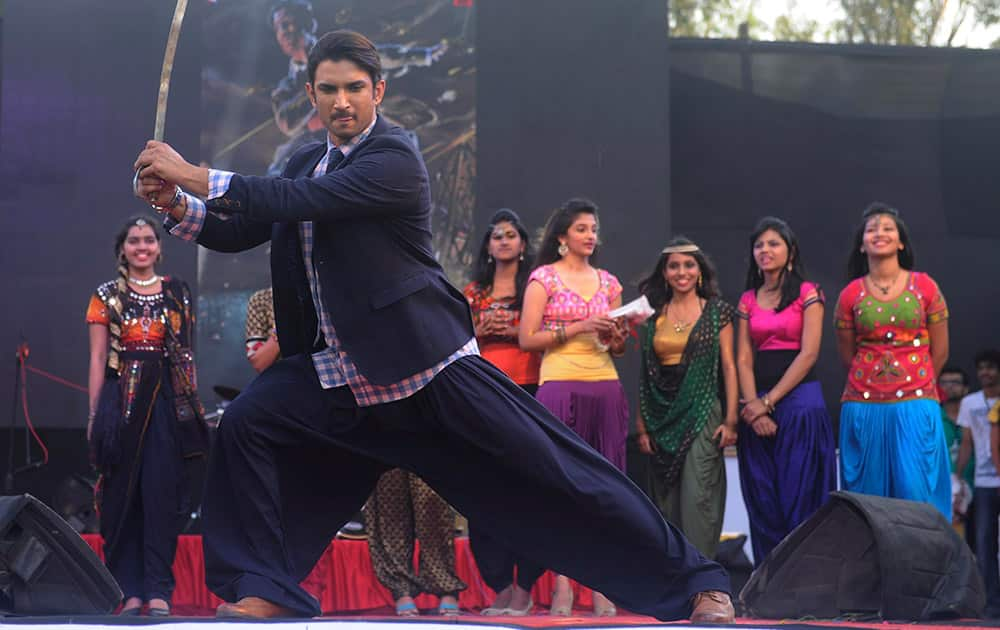 Sushant shows his grovy moves, during a fashion show inspired by his upcoming film Detective Byomkesh Bakshi at K J Somaiya College annual festival Symphony 2015 in Mumbai. -DNA