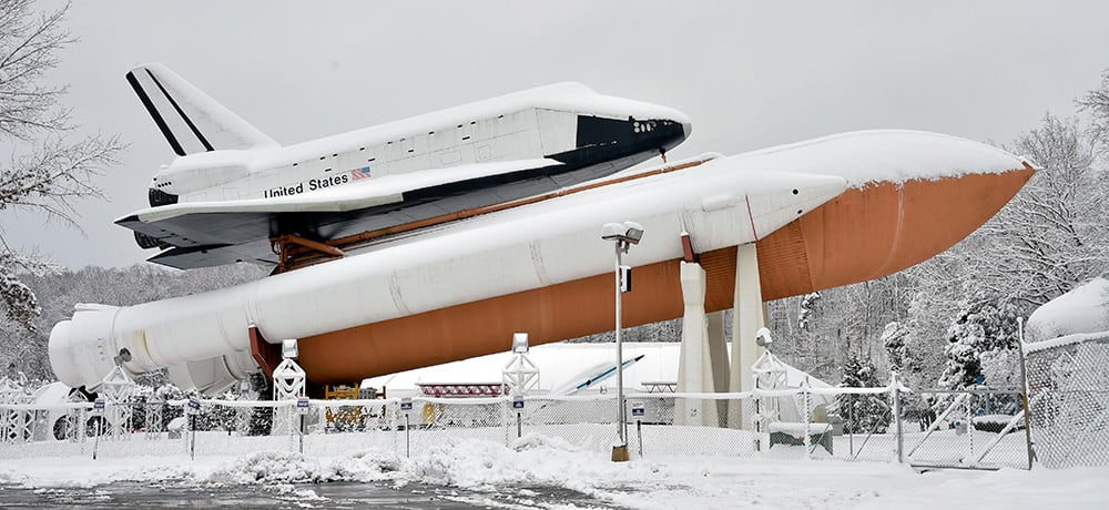 Snow covers the Space Shuttle Pathfinder display at the US Space & Rocket Center, in Huntsville, Ala.