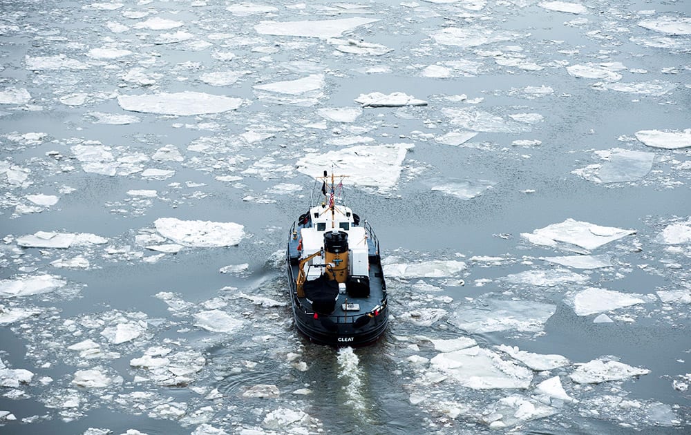 The U.S. Coast Guard Cutter Cleat operates in the Delaware River as part of its winter ice breaking mission.