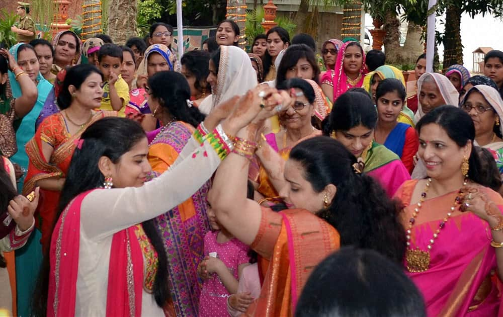 Family members and relatives of SP Chief Mulayam Singh Yadav dance during the departure of Tej Pratap Yadavs Baraat from Etawah