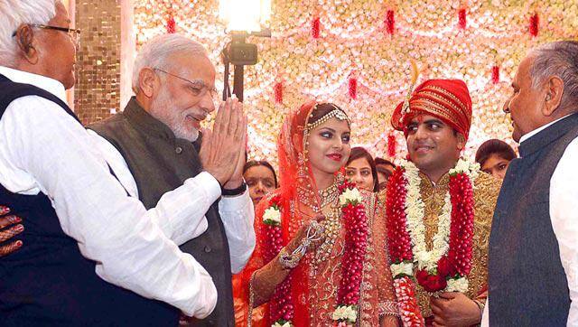 PRIME MINISTER NARENDRA MODI AT THE WEDDING CEREMONY OF TEJ PRATAP SINGH YADAV, GRAND-NEPHEW OF SP CHIEF MULAYAM SINGH YADAV (R) AND RAJ LAXMI, DAUGHTER OF LALU PRASAD.