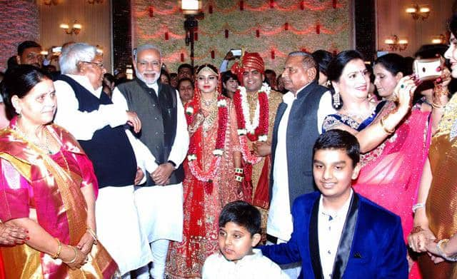 PRIME MINISTER NARENDRA MODI AT THE WEDDING CEREMONY OF TEJ PRATAP SINGH YADAV, GRAND-NEPHEW OF SP CHIEF MULAYAM SINGH YADAV (R) AND RAJ LAXMI, DAUGHTER OF LALU PRASAD.