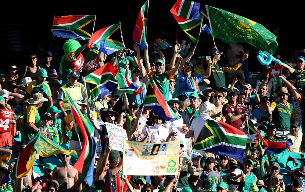 South African supporters cheer their team during their Cricket World Cup Pool B match against the West Indies in Sydney, Australia.