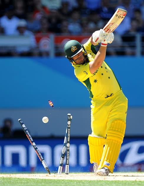 Australian batsman Aaron Finch is bowled during their Cricket World Cup match against New Zealand in Auckland.