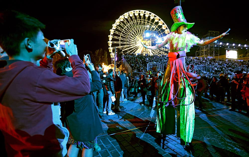 Revelers parade during France's first gay carnival, 'Lou Queernaval', in Nice, southeastern France.