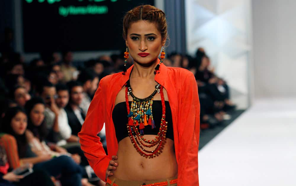 A model presents creations by Pakistani designer Huma Adnan at Expo Pakistan Fashion Show 2015.