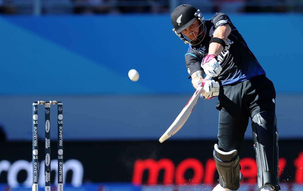 Australian batsman Brad Haddin hit's the ball as New Zealand wicketkeeper Luke Ronchi watches during their Cricket World Cup match in Auckland, New Zealand.