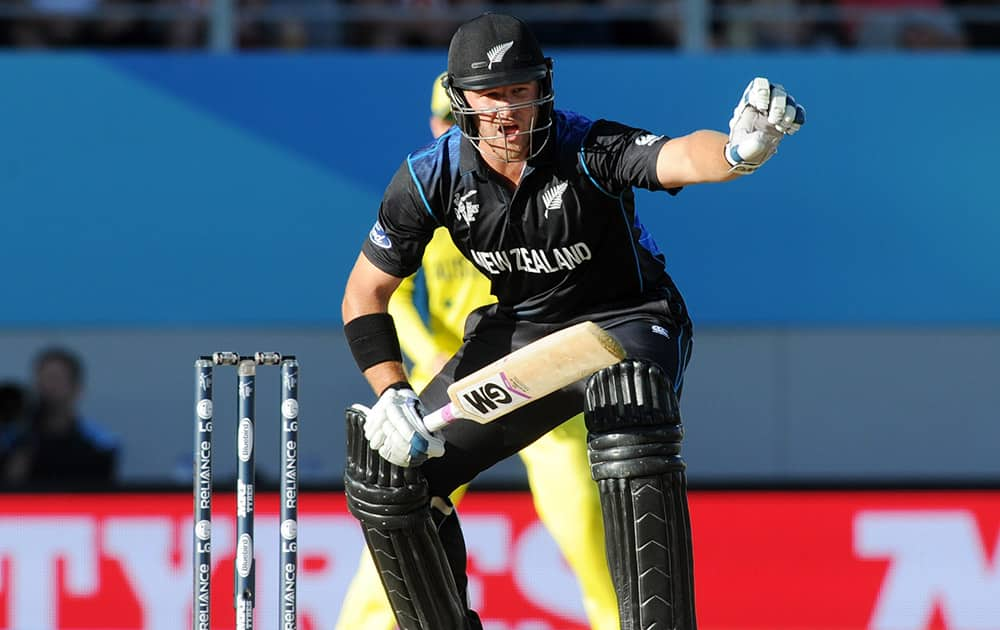 New Zealand's Corey Anderson yells at his batting partner during their Cricket World Cup match against Australia in Auckland, New Zealand