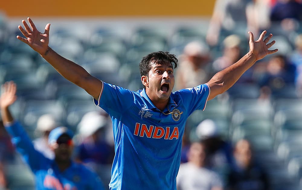 Mohit Sharma appeals for the wicket of United Arab Emirates Rohan Mustafa during their Cricket World Cup Pool B match in Perth, Australia.