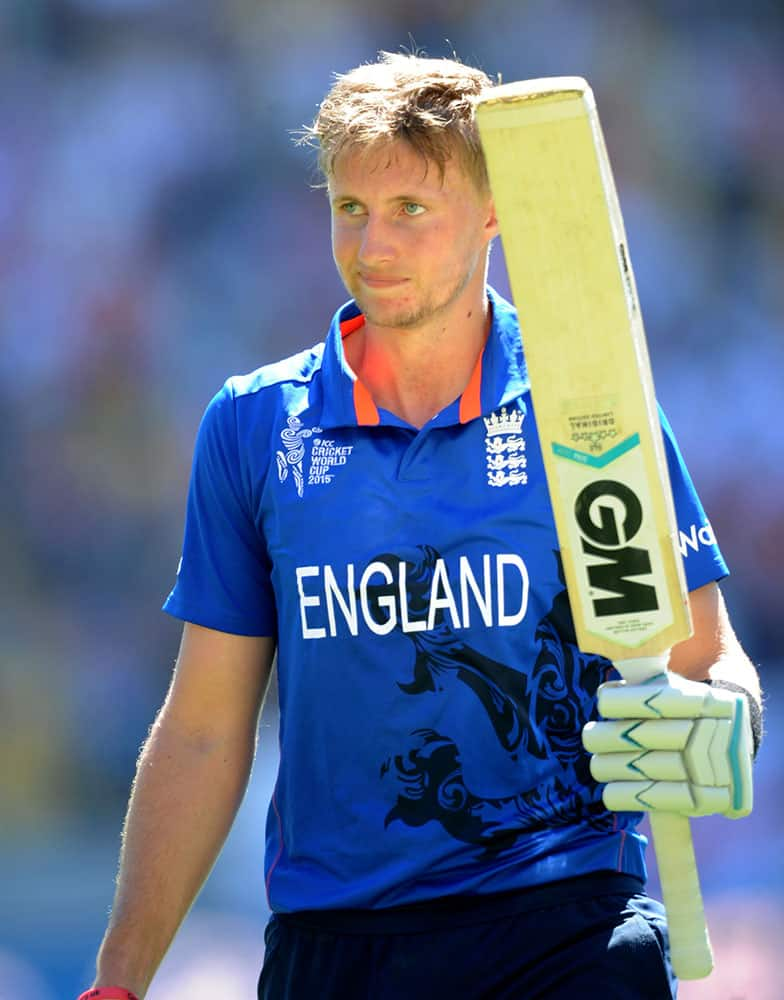 England's Joe Root waves to the crowd as he leaves the field after he was dismissed for 121 runs during their Cricket World Cup match in Wellington, New Zealand.