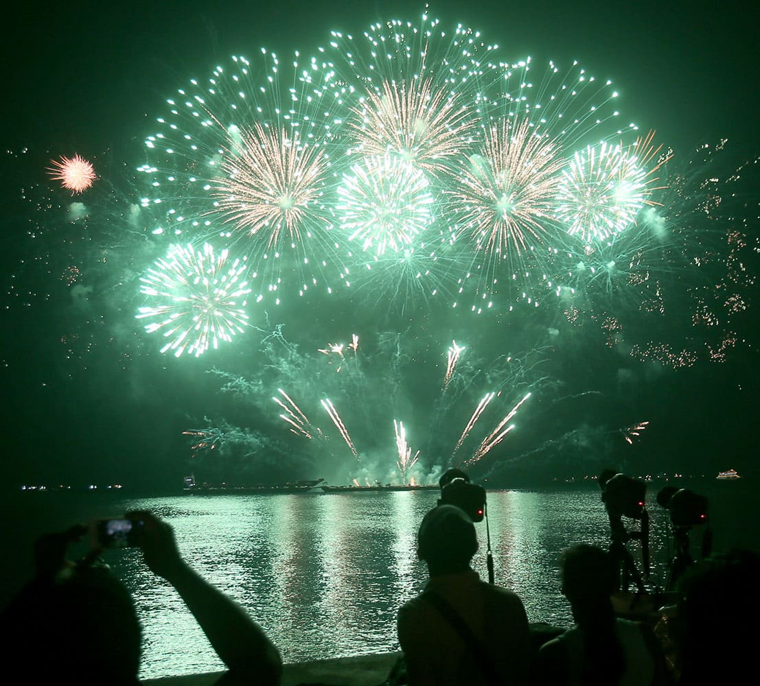 Filipinos are treated to a fireworks spectacle from Grupo Luso of Portugal during the 6th International Pyro Musical Competition at the Mall of Asia at suburban Pasay city south of Manila, Philippines. Twelve countries are participating in the fireworks competition with Canada winning the championship last year.