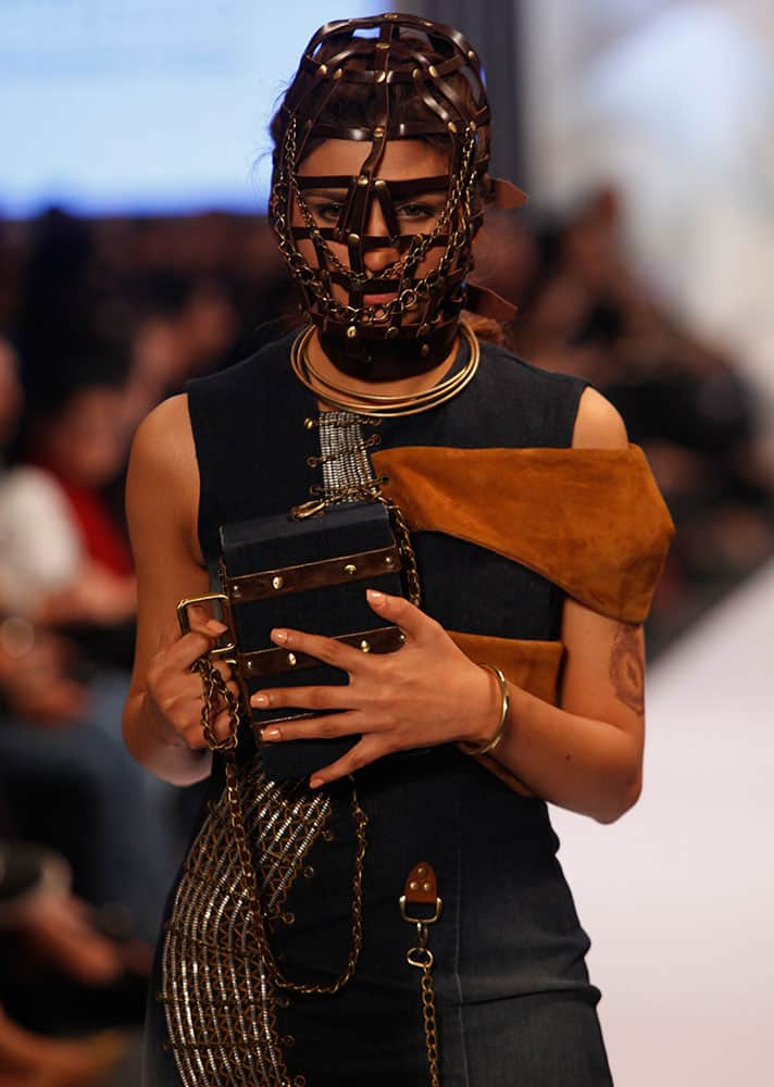 A model presents creations by Pakistan Institute of Fashion and Design at Expo Pakistan Fashion Show.