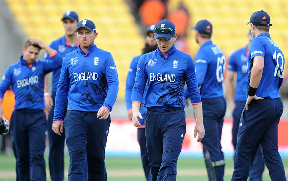 England’s captain Eoin Morgan leads his player's from the field after they lost to Sri Lanka by nine wickets during their Cricket World Cup match in Wellington, New Zealand.