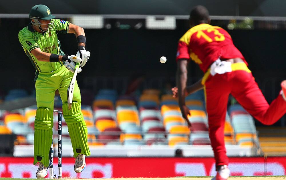 Pakistan's Misbah ul-Haq plays a shot off Zimbabwean Tendai Chatara during the Pool B Cricket World Cup match in Brisbane, Australia.